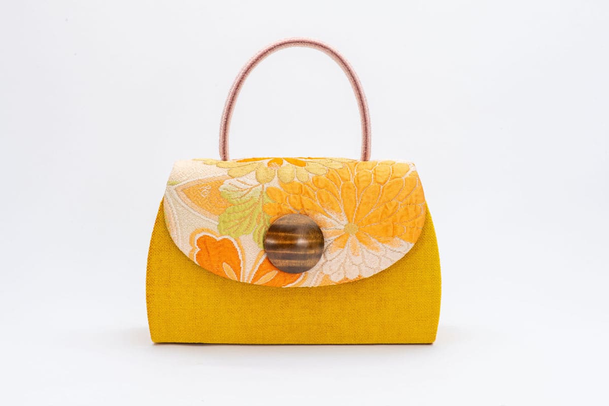 Handmade bag with tortoise shell and chrysanthemum flower design (yellow)